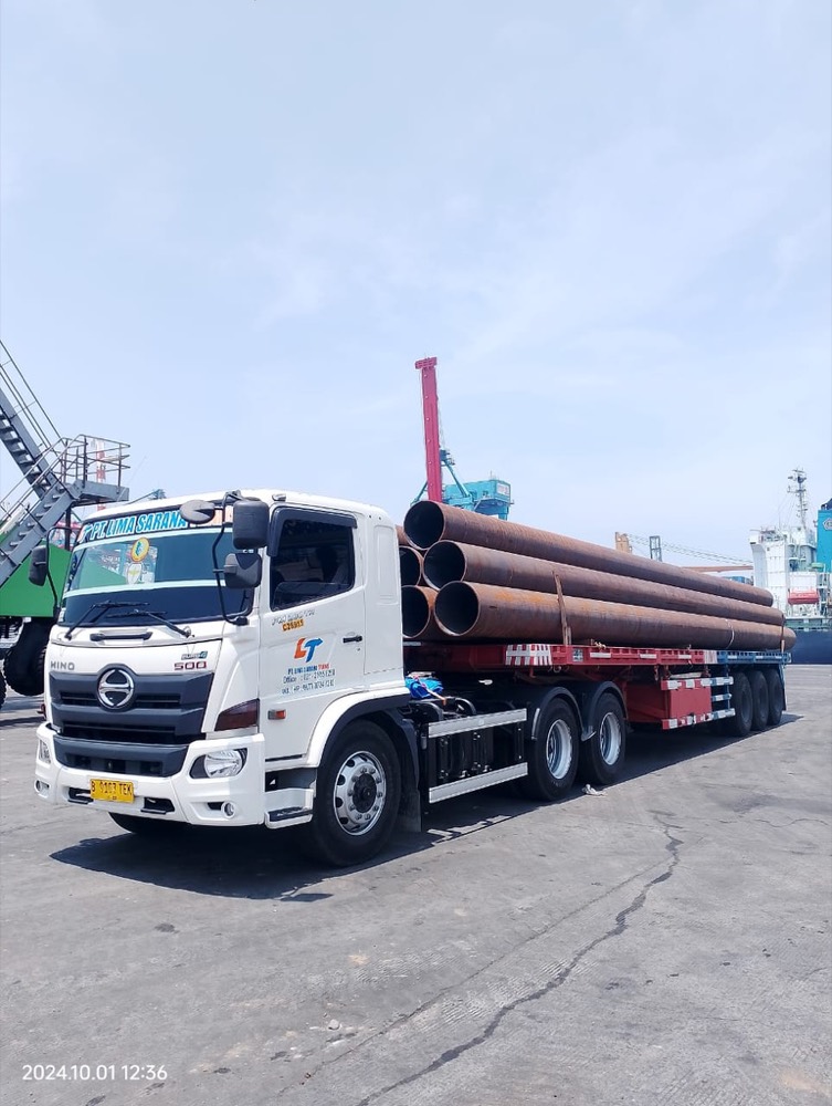 LST Hino truck loaded with steel pipes